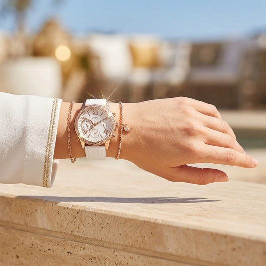 Guess Solar Multi-Function W1135L1 Rose Gold Case Crystal Bezel White Rubber Women's Watch